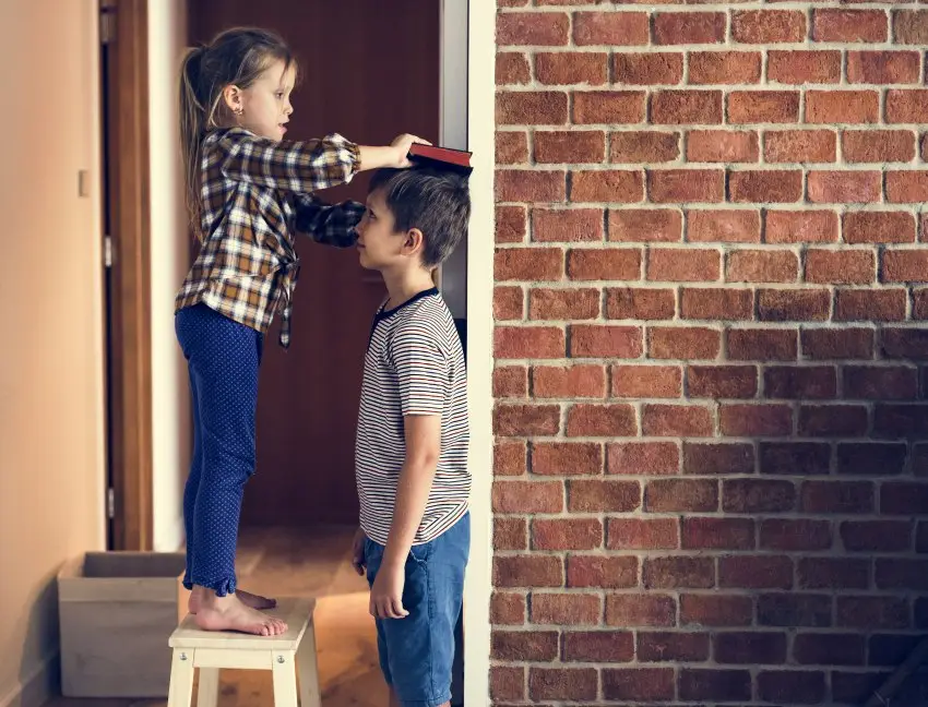 Kids checking height after the yoga exercise