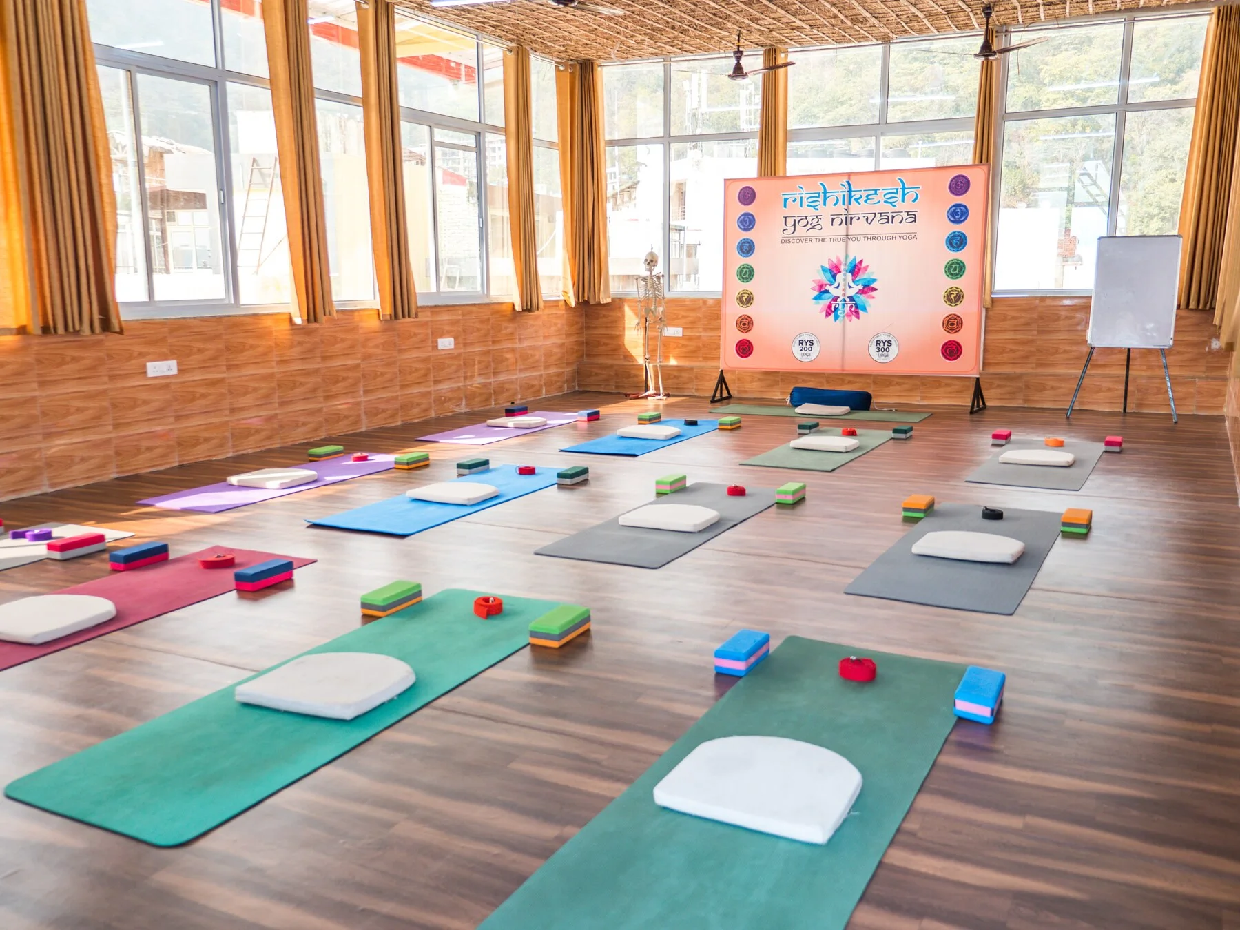 Practice-friendly campus and yoga spaces for the 100 hour teacher training at Rishikesh Yog Nirvana, Tapovan