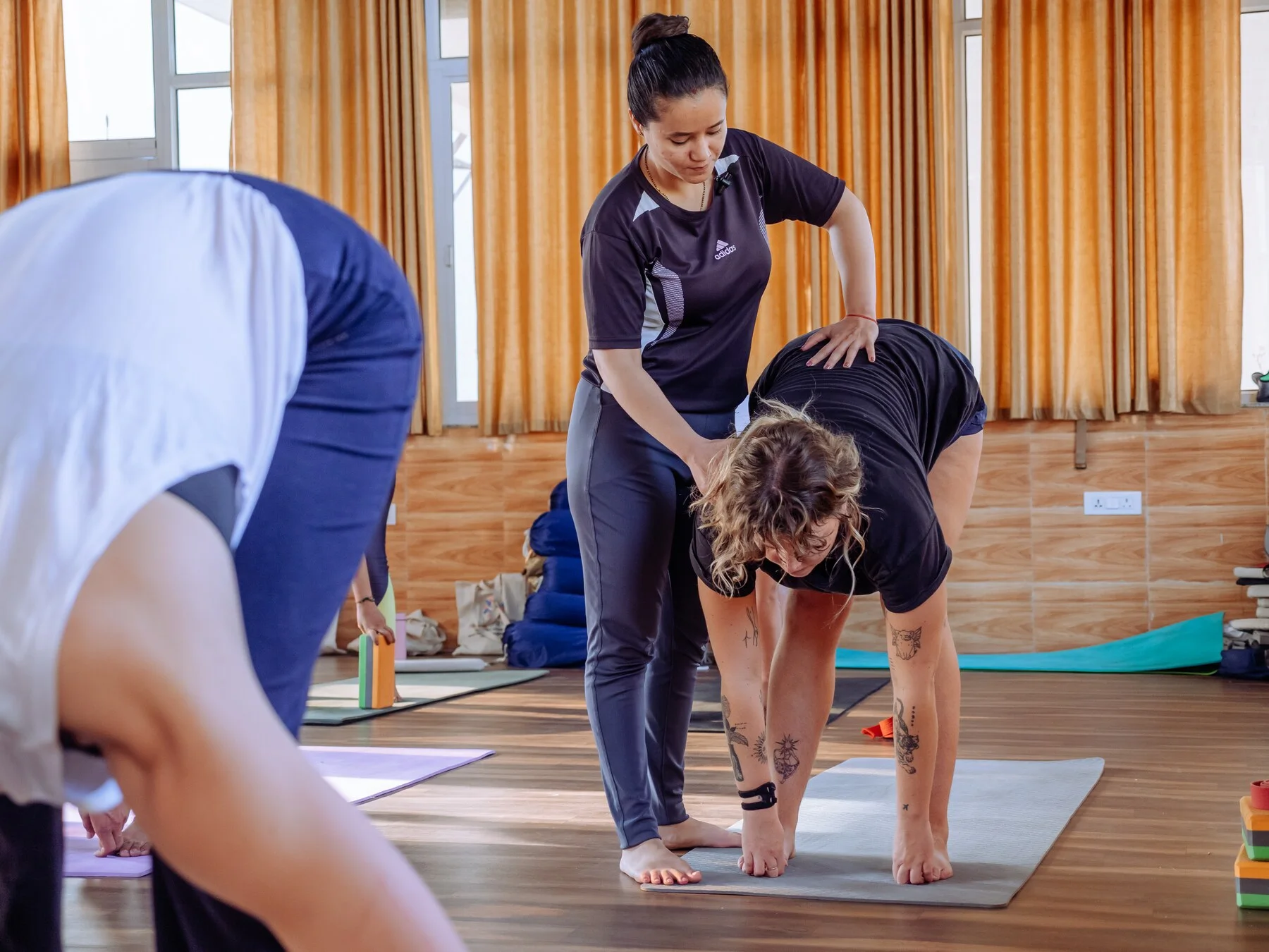 Body alignment, adjustments, and safe asana practice in the 200 hour course at Rishikesh Yog Nirvana